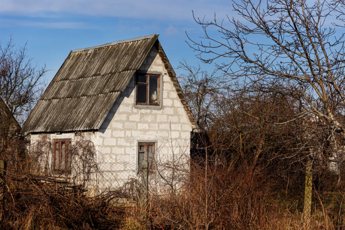 View of old and abandoned house in nature